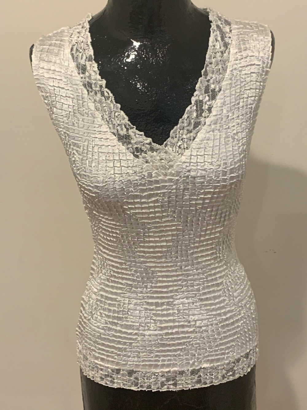 NICOLA White stretch Top trimmed with lace.